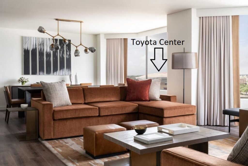 a room at the Four Seasons Houston hotel with the Toyota Center visible through the window