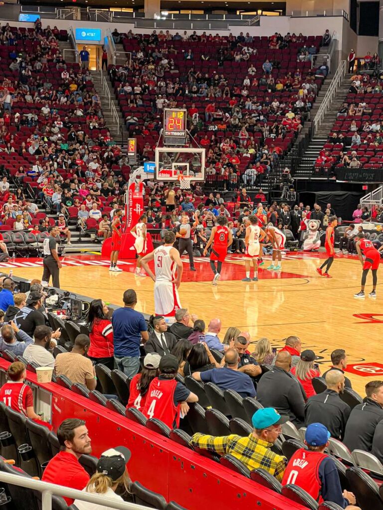 the Houston Rockets play an NBA game against the Toronto Raptors in the Toyota Center area