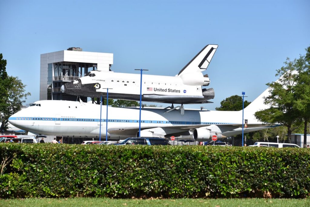 The Space Shuttle sits on top of a 747 at the NASA Johnson Space Center in Houston, TX