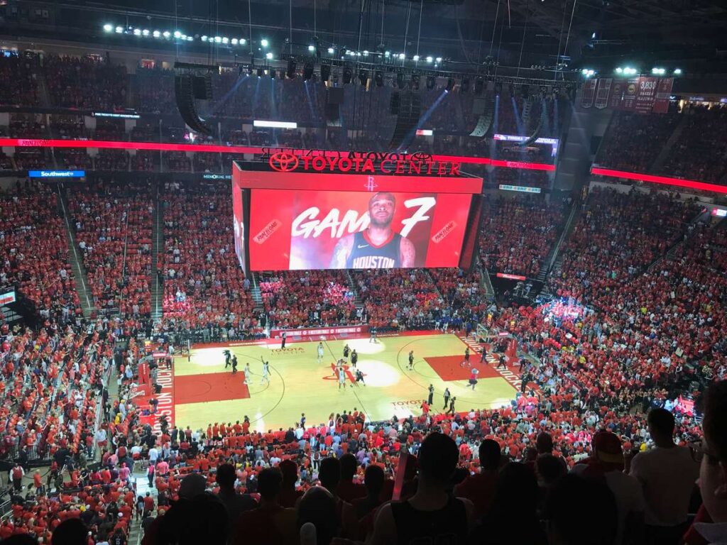 The Jumbotron says "Game 7" at a Houston Rockets playoff game at the Toyota Center