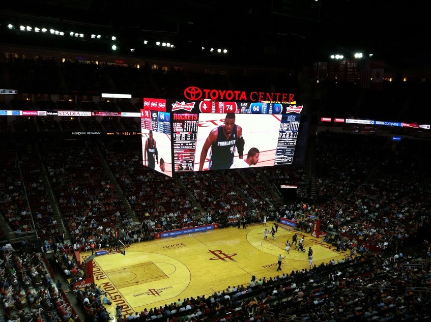 a Houston Rockets basketball game as seen from the upper level of the Toyota Center arena