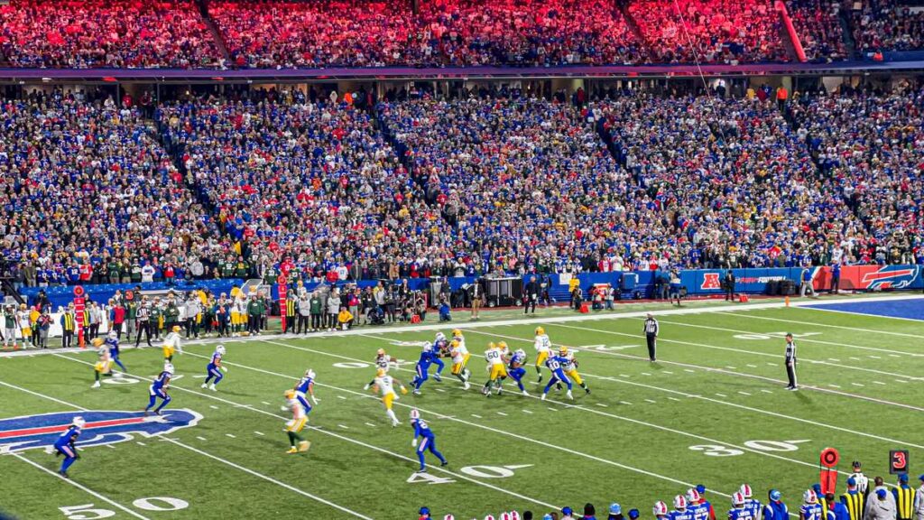 Aaron Rodgers looks for a wide receiver while playing the Buffalo Bills on Sunday Night Football