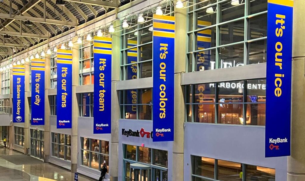 inspirational flags hang in the lobby of the KeyBank Center in Buffalo, NY