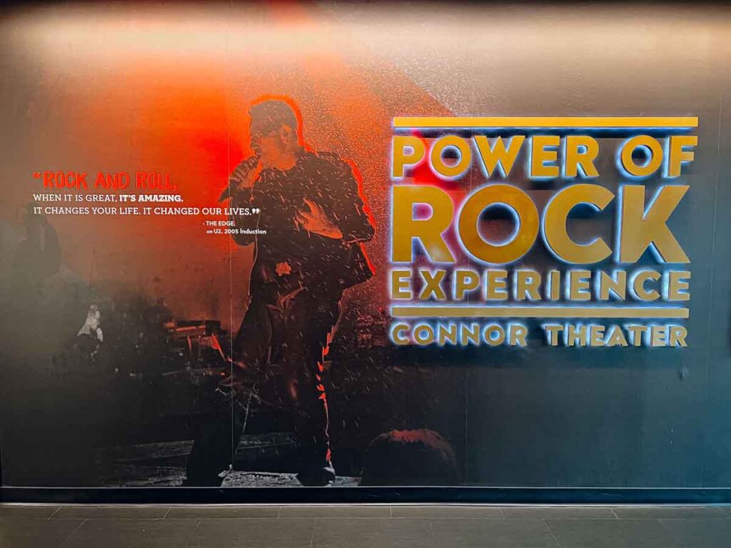 The entrance sign for the Power of Rock Experience at the Rock & Roll Hall of Fame in Cleveland, Ohio.