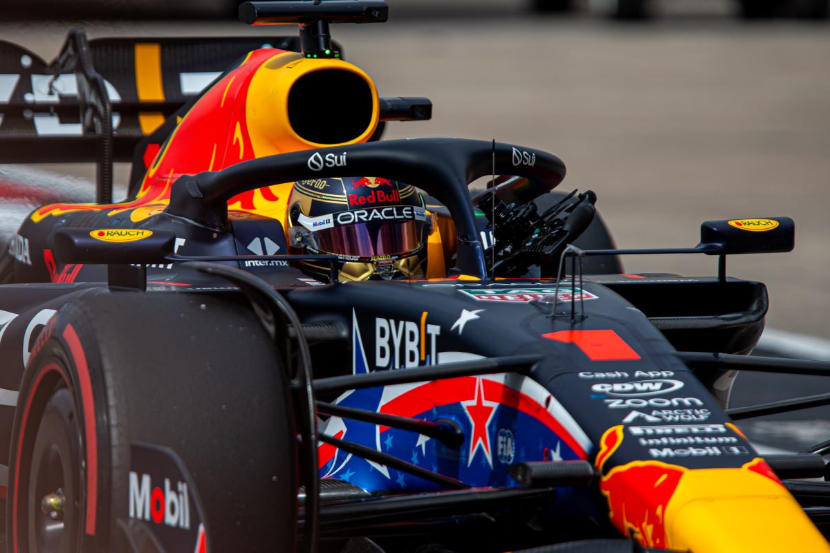 An F1 race is an amazing mancation idea. Here Max Verstappen drives a Red Bull F1 car.