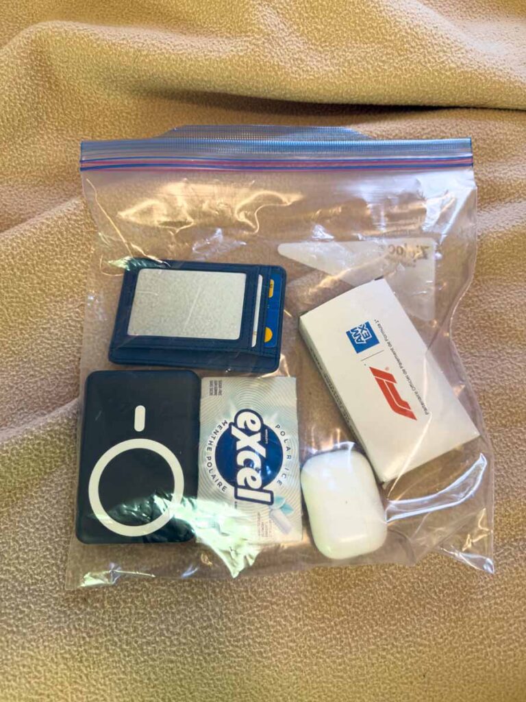 a Ziplock bag protects Dan Brewer's valuables on a rainy day at the Canadian Grand Prix.