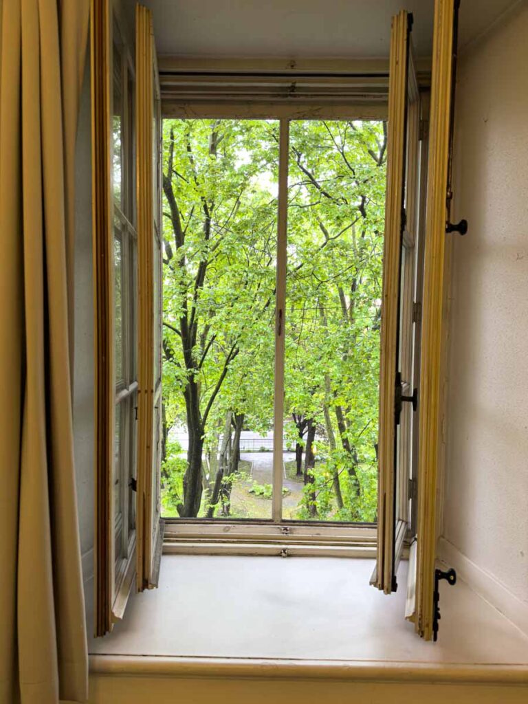 The large window in my room at the Grey Nuns Residence had screens to keep bugs out.