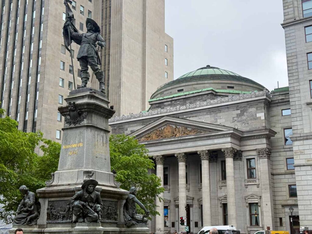 Historic buildings and statues give Place d’Armes in Montreal a distinct European feel.