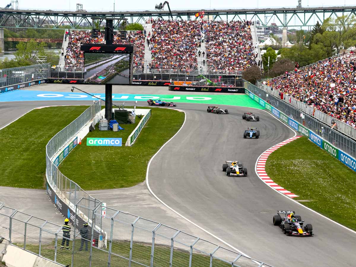 F1 cars on a formation lap during the Saturday Sprint race at the Montreal Grand Prix.